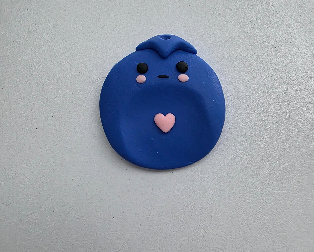 sad blueberry worry stone