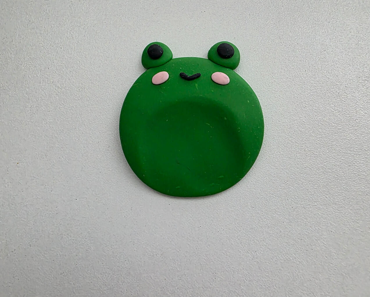 cute smiling frog worry stone
