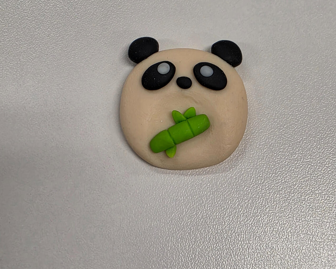 cute panda worry stone with bamboo