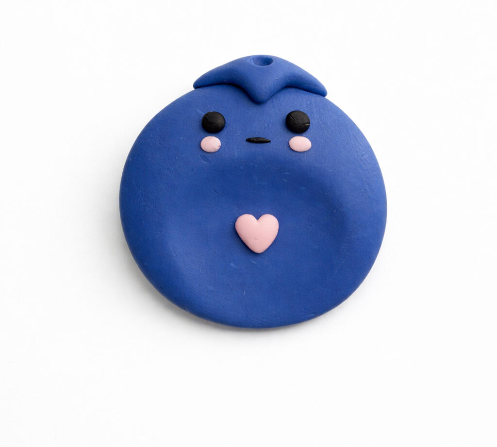 sad blueberry worry stone