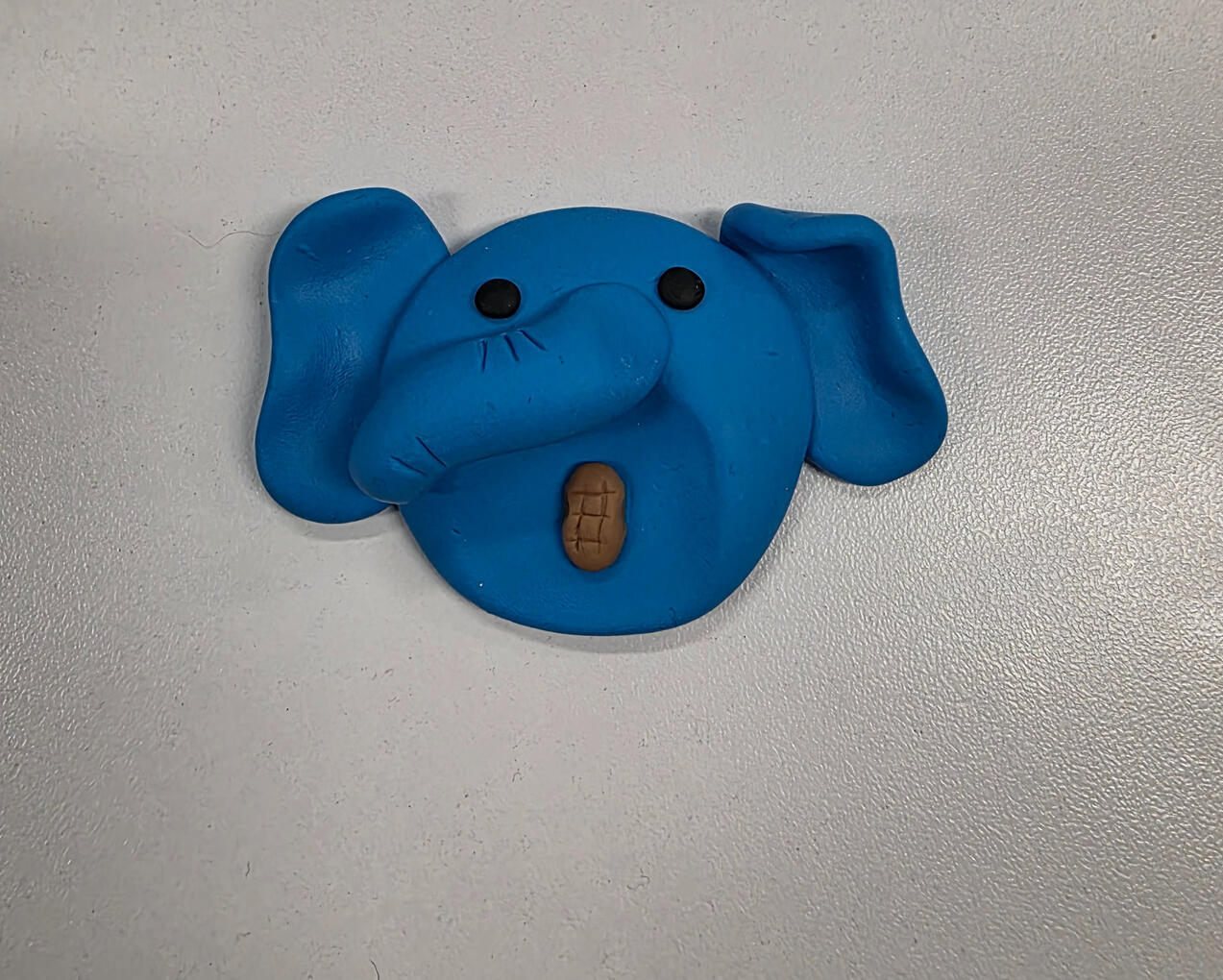 cute elephant worry stone with peanut