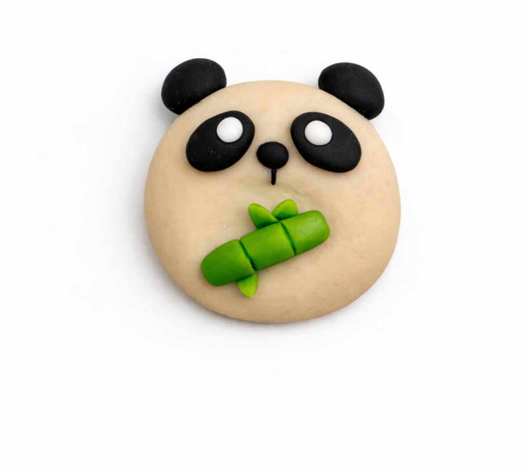 cute panda worry stone with bamboo